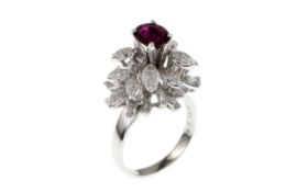 Ring 9.9g 750/- Weissgold mit 58 Diamanten zus. ca. 0.58 ct. und Rubin. Ringgroesse ca. 60