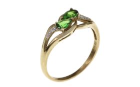 Ring 2.64g 333/- Gelbgold mit 4 Diamanten zus. ca. 0.02 ct. und Turmalinen. Ringgroesse ca. 66