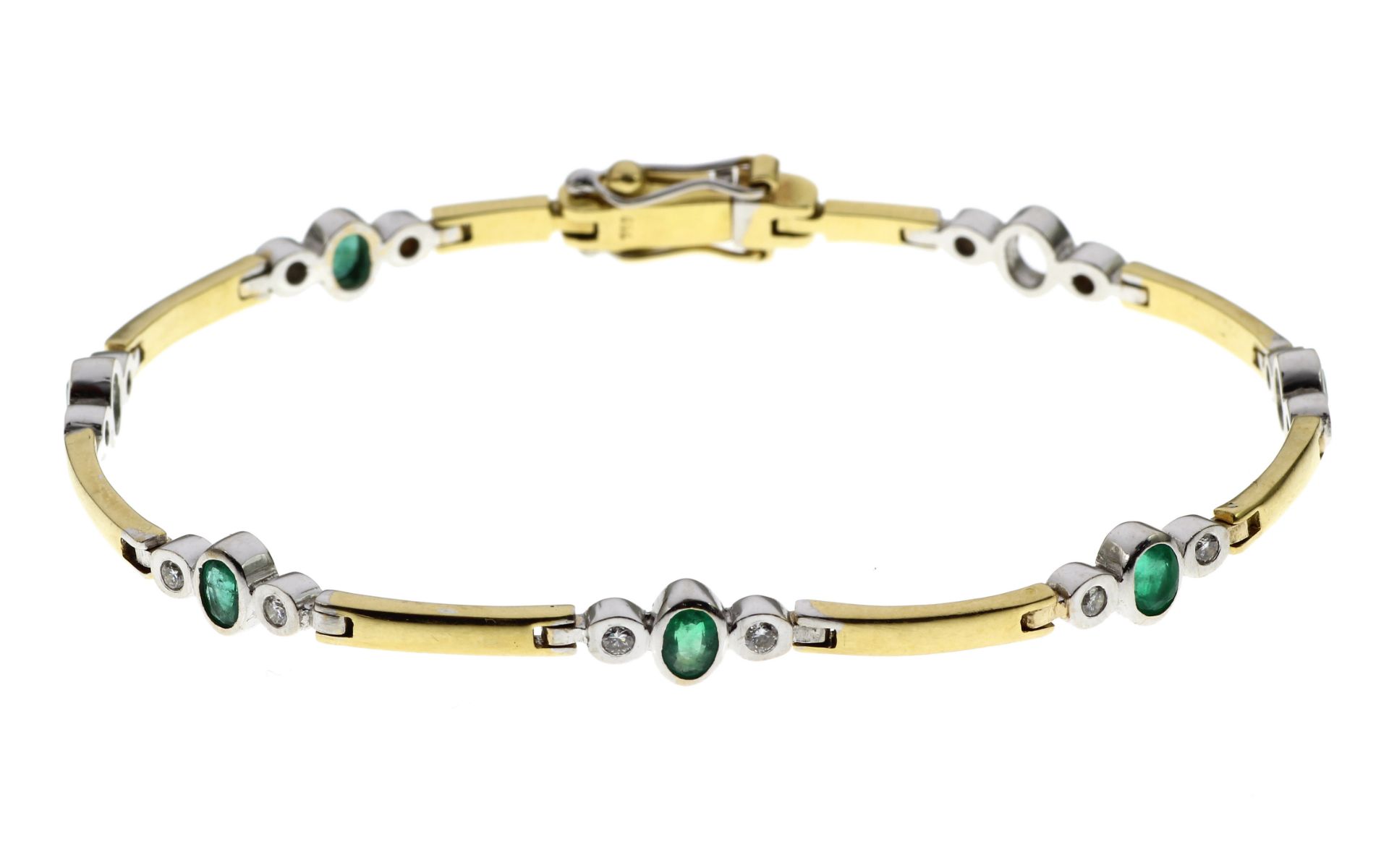 Armband 12.96g 750/- Gelbgold und Weissgold mit 14 Diamanten zus. ca. 0.14 ct. und Smaragden. Laenge