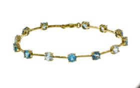 Armband 6.82g 375/- Gelbgold mit Goldschliesse 585/- Gelbgold und Topas. Laenge ca. 19 cm