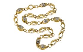 Kette 19.71g 585/- Gelbgold und Weissgold. Laenge ca. 59 cm