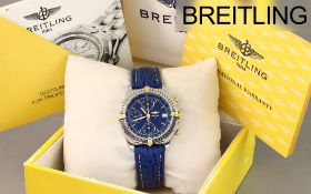 Breitling Chronomat Ref. B13050 Automatik 750/- Gelbgold/Edelstahl. mit Box und mit Papiere. Kaufdat