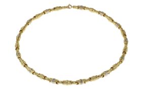 Kette 33.34g 585/- Gelbgold und Weissgold. Laenge ca. 65 cm