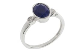 Ring 2.94g 750/- Weissgold mit 2 Diamanten zus. ca. 0.06 ct. und Lapislazuli. Ringgroesse ca. 55