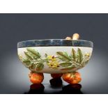 A WEDGWOOD PORCELAIN SALAD BOWL AND SILVER PLATE SERVERS. HAND PAINTED, WITH TOMATO FEET.