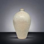 A CHINESE CARVED QINGBAI MEIPING VASE. OVOID BODY RAISING FROM A SHORT FOOT TO A BROAD SHOULDER AND