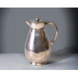 A CHRISTOPHER DRESSER STYLE SILVER PLATE JUG.BY MARTIN HALL, CIRCA 1875. DECORATED IN JAPANESE STYLE