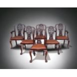 A SET OF SIX LATE 19TH CENTURY CHIPPENDALE STYLE DINING CHAIRS. SOLID MAHOGANY CARVED & PIERCED BACK