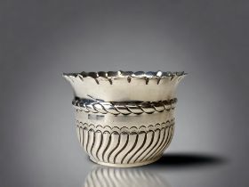 A Solid silver embossed small side bowl. By S. Blackensee & sons, Birmingham. H/M Birmingham 1886. w