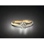 An 18ct gold ladies Diamond solitaire ring. H/M as 40 points. Size N.