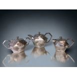 A 19TH CENTURY JAPANESE SILVER PLATED TEA SET. MEIJI PERIOD. RELIEF DECORATED WITH RELIEF CHRYSANTH