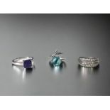 A COLLECTION OF THREE STERLING SILVER LADIES RINGS.