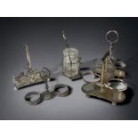 A COLLECTION OF FIVE CHRISTOPHER DRESSER STYLE SILVER PLATE CONDIMENT STANDS.