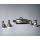 A COLLECTION OF FOUR STERLING SILVER SALT & PEPPER SHAKERS. TOGETHER WITH A SILVER PLATE GLASS LINED