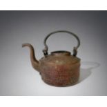 AN 18th/19th CENTURY COPPER TEAPOT, WITH BRONZE HANDLE. HEIGHT - 22CM