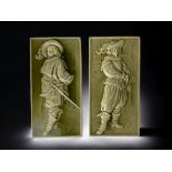 A PAIR OF VICTORIAN MINTON PORCELAIN 'MUSKETEER' GLAZED TILES. 30.5 X 15CM