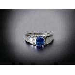 A ladies 18ct white gold, Sapphire and Diamond ring. size O