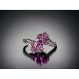 A 9ct white gold ladies Pink Tourmaline twist ring. Size R.