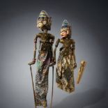 A PAIR OF HAND PAINTED THAI MARIONETTE SHADOW PUPPETS.