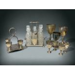 A COLLECTION OF 19th CENTURYSILVER PLATE. INCLUDING CONDIMENT SET, EGG CUPS & TROPHIES.