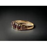 A 9ct gold ladies vintage Garnet dress ring. size O