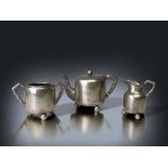 A VICTORIAN SILVER PLATE JAPANESE STYLE BATCHELORS TEA SET. BY JAMES PINDER & CO, SHEFFIELD. TEAPOT