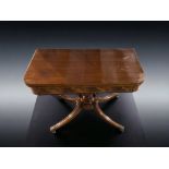 Quality Regency style swivel top mahogany card table with square tapering splayed legs with brass ca