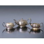 A CHRISTOPHER DRESSER STYLE SILVER PLATE TEASET.