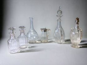 A COLLECTION OF 19TH CENTURY DECANTERS & EWERS. AF