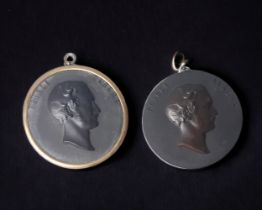 TWO VICTORIAN BOIS DURCI PORTRAIT MEDALLIONS FEATURING PRINCE ALBERT. DIAMETER - 12CM