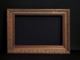 A LARGE VICTORIAN CARVED GILTWOOD PICTURE FRAME. CARVED ACORD DESIGN. 116 X 85CM