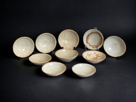 A LARGE COLLECTION OF 10 CHINESE QINGBAI BOWLS. SONG DYNASTY & LATER.