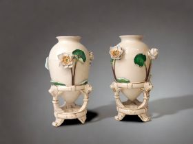 A PAIR OF CHRISTOPHER DRESSER FOR MINTON 'CHINESE TRIPOD' VASES. RELIEF LILY DESIGN. DATE CYPHERS