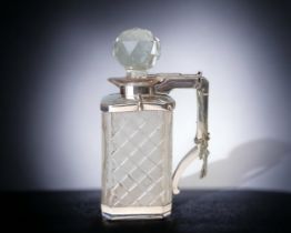 A VICTORIAN SILVER PLATE & CRYSTAL LOCKING DECANTER. STYLISED DIAMOND PATTERN WITH SPRING LOADED