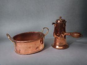 A 19TH CENTURY COPPER COFFEE POT, TOGETHER WITH A COPPER PRESERVE POT.