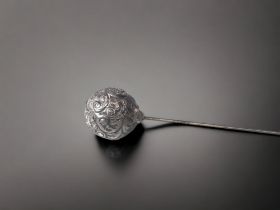 A STERLING SILVER LADIES HAT PIN.