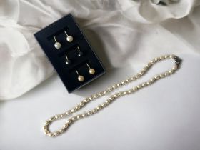 3 pairs of cultured pearl clip earrings and necklace.