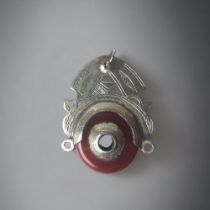 AFRICAN TRIBAL SILVER TUAREG PENDANT. SET WITH A POLISHED RED AGATE. ENGRAVED DESIGN. 55 X 40MM