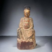 A CHINESE POLYCHROME PAINTED WOODEN TEMPLE FIGURE. LATE MING DYNASTY. HEIGHT - 25CM