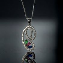 A multi gemset w/g 925 silver pendant and chain.