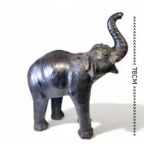 A LARGE VINTAGE LIBERTY OF LONDON? LEATHER MOUNTED MODEL OF AN ELEPHANT. HEIGHT - 78CM