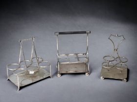 THREE 19TH CENTURY CHRISTOPHER DRESSER STYLE SILVER PLATE CONDIMENT STANDS.