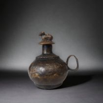 A 19TH CENTURY INDIAN TEMPLE INCENSE POT. HEIGHT - 7CM