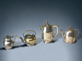 A COLLECTION OF FOUR 19TH CENTURY SILVER PLATE TEAPOTS.