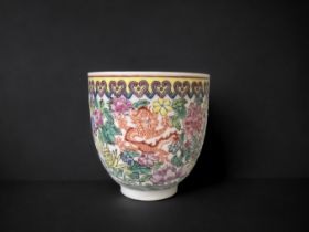 A CHINESE EGGSHELL PORCELAIN FAMILLE ROSE CUP. POLYCHROME PAINTED OVERGLAZE ENAMELS DRAGONS &