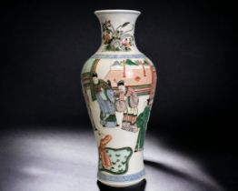 A CHINESE FAMILLE VERTE PORCELAIN VASE. ENAMELS PAINTED COURT SCENES. BLUE BORDER PATTERN TO