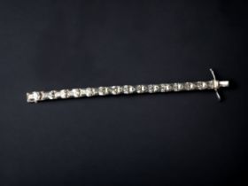 A STERLING SILVER & CRYSTAL BRACELET. LENGTH - 20.5CM