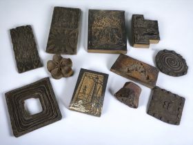 A COLLECTION OF 11 MISCELLANEOUS ANTIQUE WOODEN PRINTING BLOCKS.