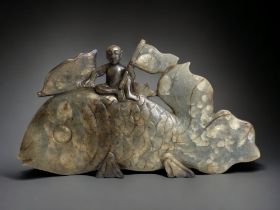 A LARGE CHINESE JADE SCULPTURE. DEPICTING A CARVED CARP WITH A FIGURE WAVING FLAGS ATOP HIS BACK. 29