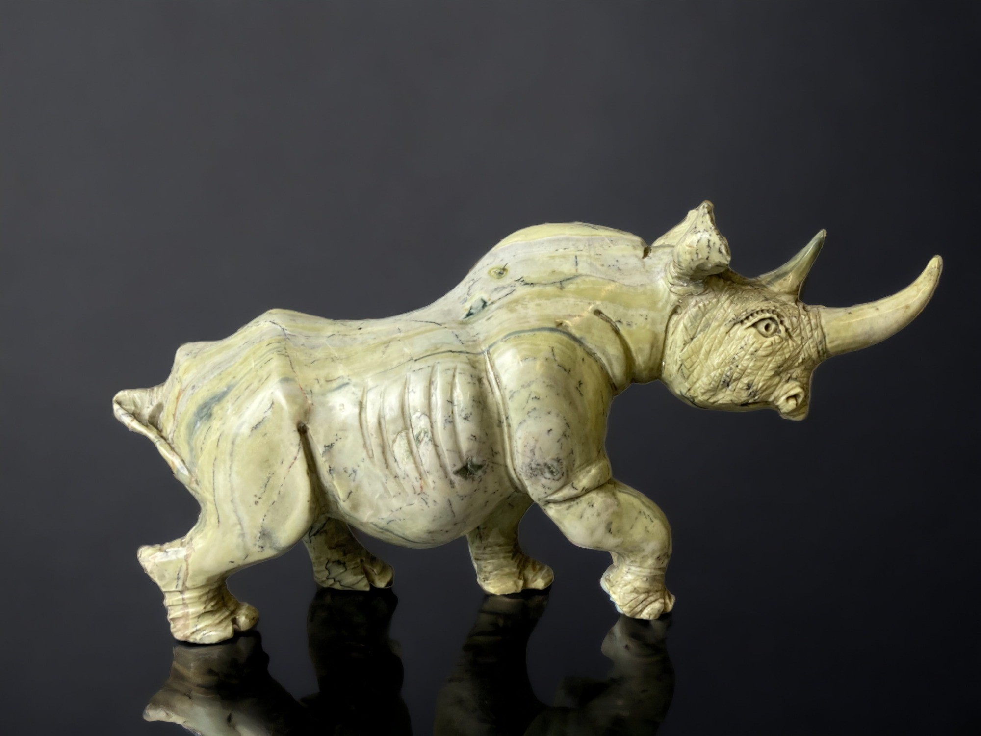 A large pair of Zimbabwean (Shona) people Butterjade Rhinoceros carved sculptures. 15 x 30cm - Image 3 of 5